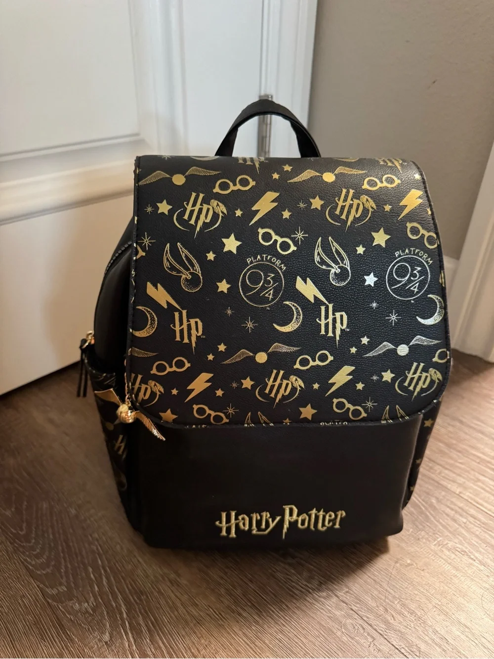 Warner Bros. Harry Potter Black & Gold Emblem Backpack